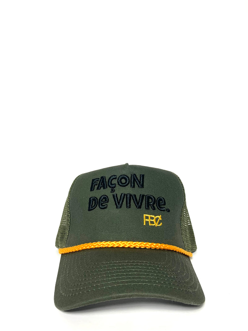 Olive/Gold Façon De Vivre. FB₵ • Trucker Hat